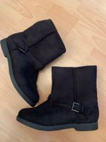 Bottines noires neuves p. 39