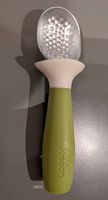 Joseph Joseph Dimple Ice Cream Scoop in green. 
