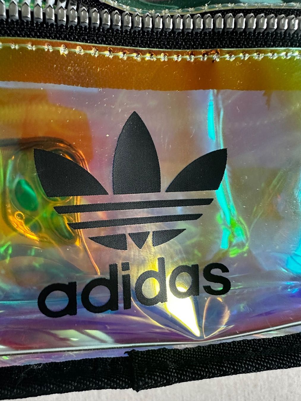 Adidas Zaini: Adidas Mini Rucksack/Daypack Transparent-Holographisch – Usato da Oberegg venduto da m.akua 2