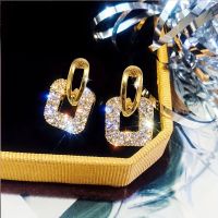 Elegante Ohrringe, goldfarben mit Strass - Neu und ungetr...