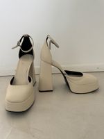 Chaussures à talons compensés blanc crème