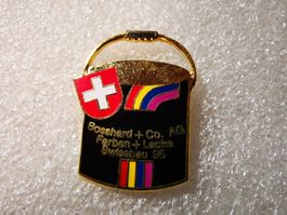 Ansteckpin 6: Bosshard + Co AG Farben und Lackierung