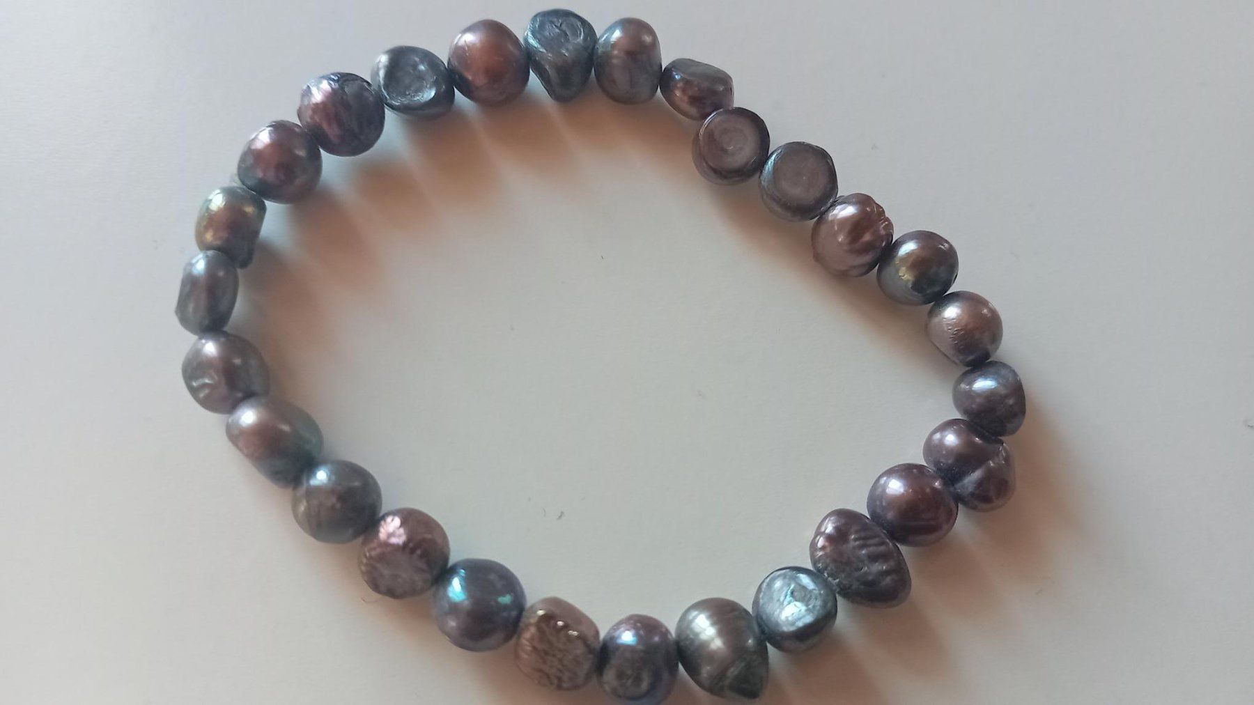 Bracciali & Braccialetti: Perlenarmband / Perlen dunkel – Usato da Salez venduto da Robe12