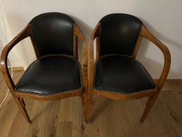 2 Fauteuils cuir noir structure bois bon état