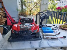 Traxxas Slash 1:10 + Voltcraft B6AC V2 Multilader + Zubehör