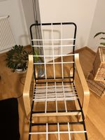 Schaukelstuhl mit Auflage schwarz Holz Gestell guter Zustand