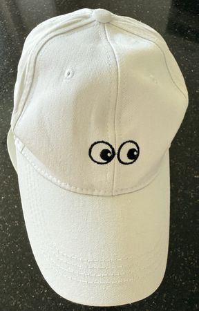 Coole, weisse Cap mit Augen-Motiv, neuwertig