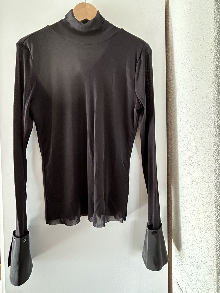 Tops: Schwarzes Rollkragenshirt mit Manschetten, Gr. L – Gebraucht aus Pfäffikon ZH von the4mos