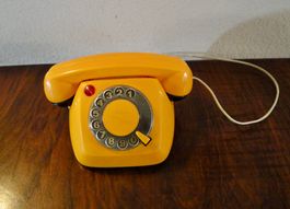 Gelbes Kinder Telefon, Wählscheibe.
