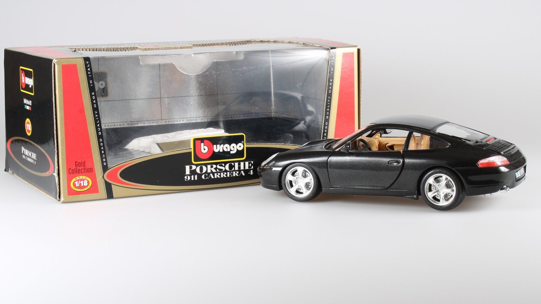 Bburago Modellautos: Porsche 911 Carrera 4  996 schwarz – Gebraucht aus Gossau SG von mifab