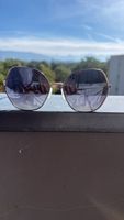 Pair of GUESS butterfly sunglasses 