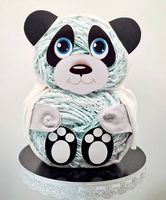Une création de couches culottes en forme de panda 