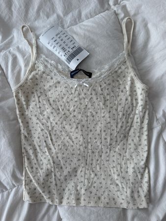 Débardeur Brandy Melville fleurs blanc taille unique neuf
