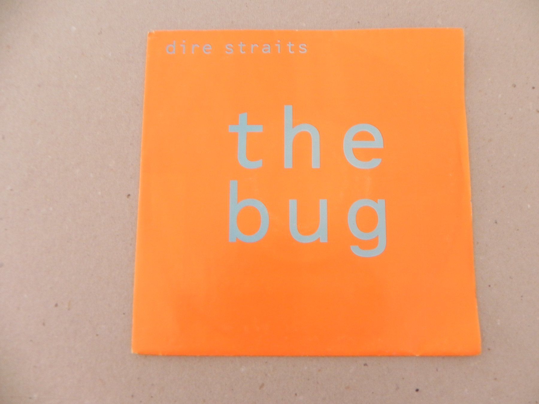 Dischi in vinile: Single brit. Rock Band Dire Straits 1992 The Bug / Twisting – Usato da Siebnen venduto da krimsie