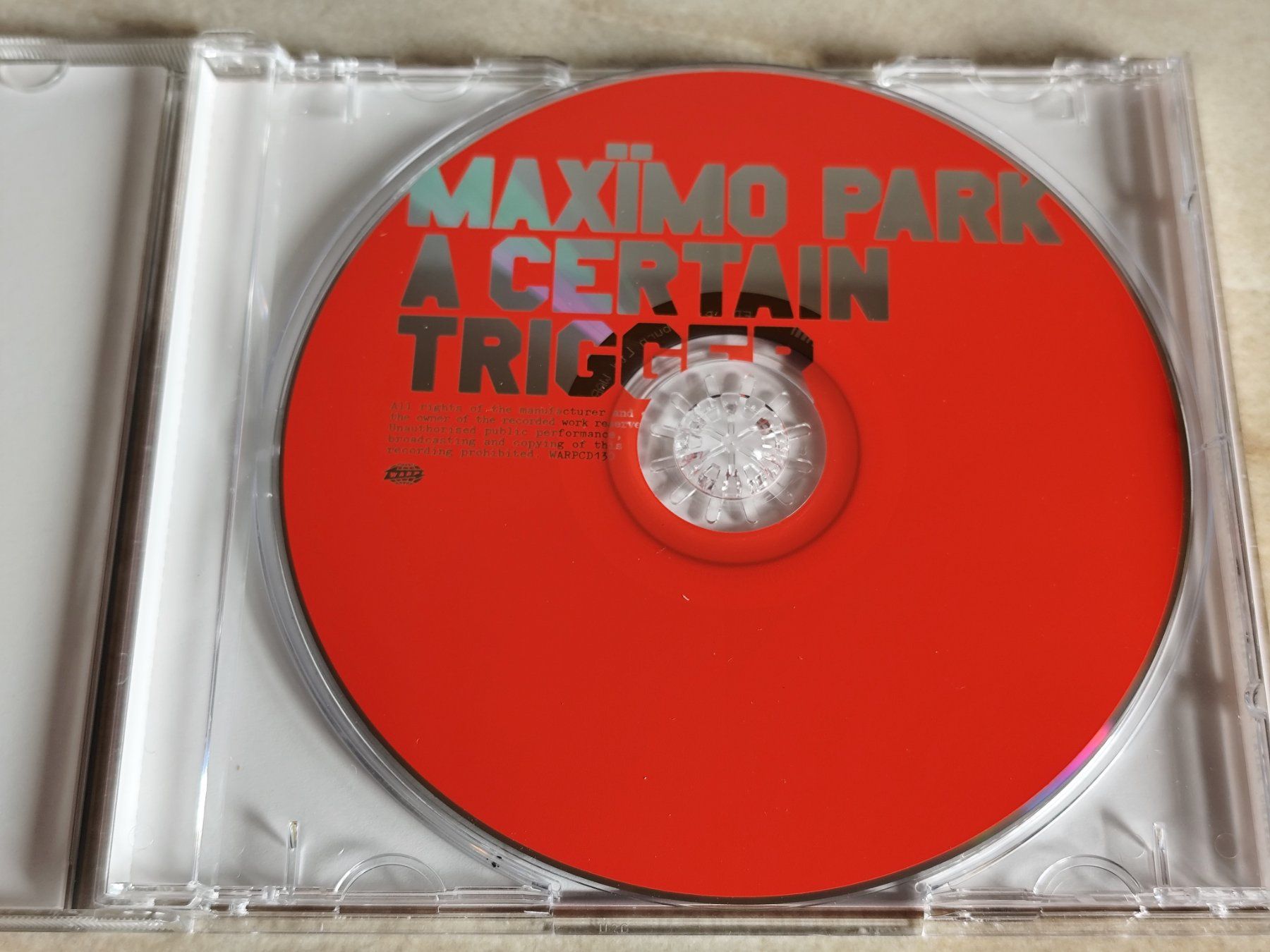 CD: MAXÏMO PARK - A CERTAIN TRIGGER (Warp Records Ltd 2005) – Usato da Ermenswil venduto da easyric 2