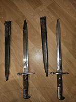 ​2 Schweizer Bajonette Modell 1918 mit Scheide