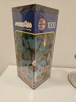 Puzzle HEYE Mordillo Lost in Paradise Orginal verpackt