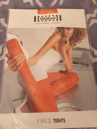 Collant arancioni Wolford, taglia XS, nuovi!