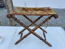 Faltbarer Hocker Holz mit Textilbezug gebrauchter Zustand