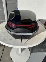 Coffre de moto universelle