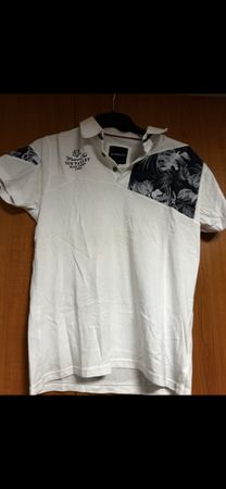 Polo blanc Sun Valley avec motif floral – Taille M