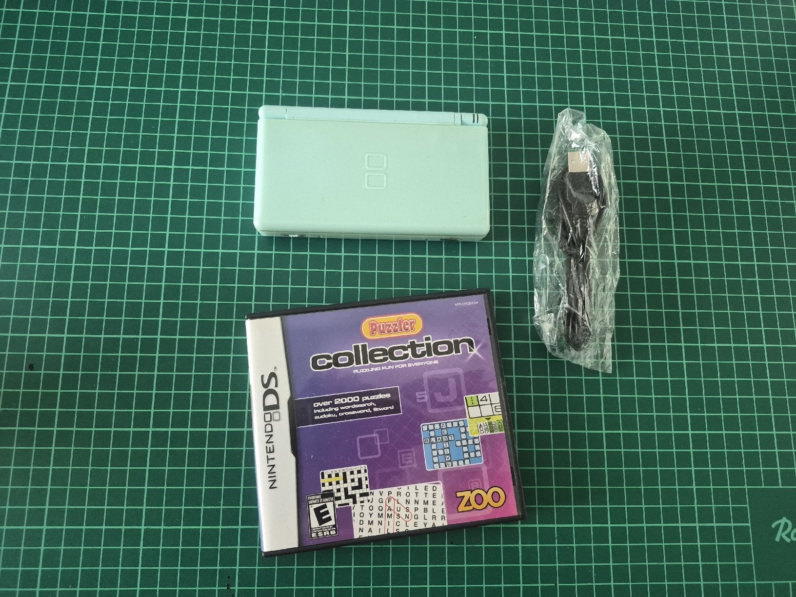 Nintendo Konsolen: Nintendo DS Lite - Ice Blue + Puzzle Collection Game! – Gebraucht aus Meyrin von Retro-GZ