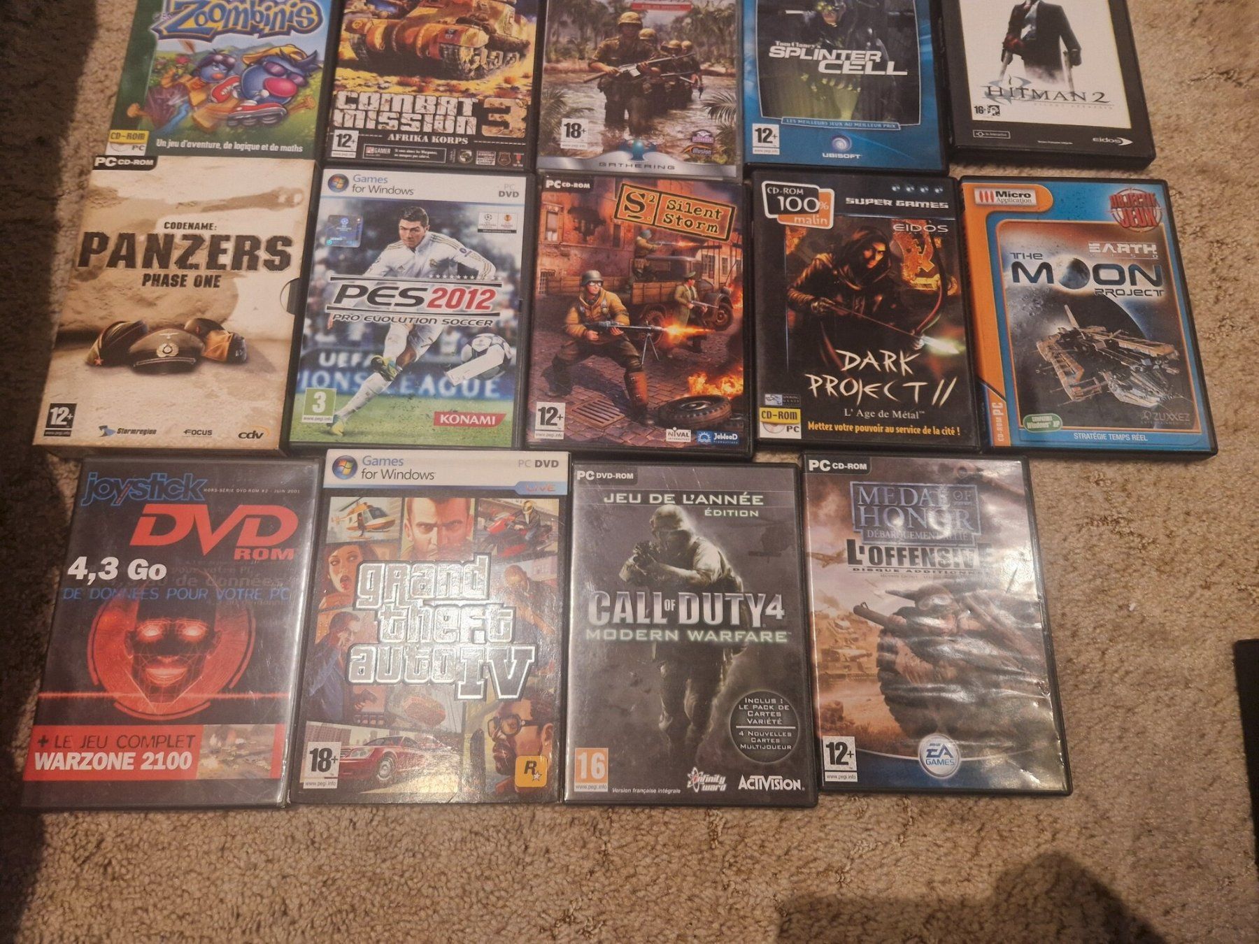 Lot 18 jeux PC rétro : GTA IV, Call of Duty 4, Hitman 2 (Gebraucht) in ...