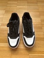 Schwarze Puma Sneaker