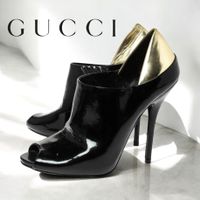 Gucci Schwarz/Metallic Gold Lackleder Peep Toe Booties Gr.34