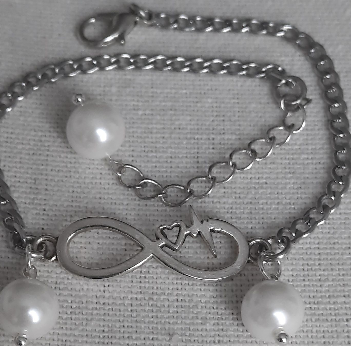 Armbänder & -reifen: Modisches Armband mit Unendlichkeitszeichen und Perlen – Neu (gemäss Beschreibung) aus Solothurn von lsc_pf99 7