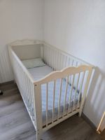 lit bébé avec deux matelas