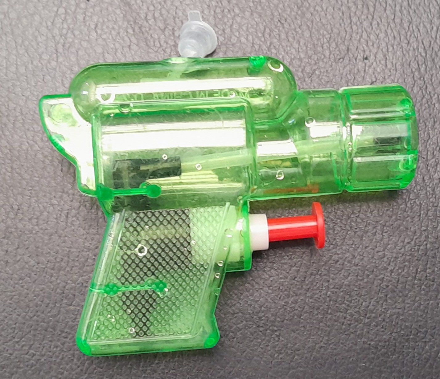 Giocattoli: Mini Wasserpistole Spielzeug diverse Farben – Usato da Zürich venduto da cole15 4