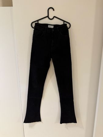 Jean noir coupe bootcut, taille 38, parfait pour l'automne!