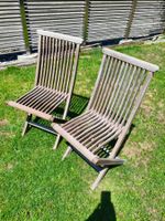Vier Gartenstühle aus Holz