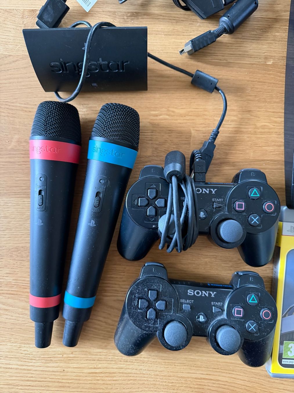 Sony PlayStation 3 usata con giochi, cavi e microfoni (Gebraucht) in ...