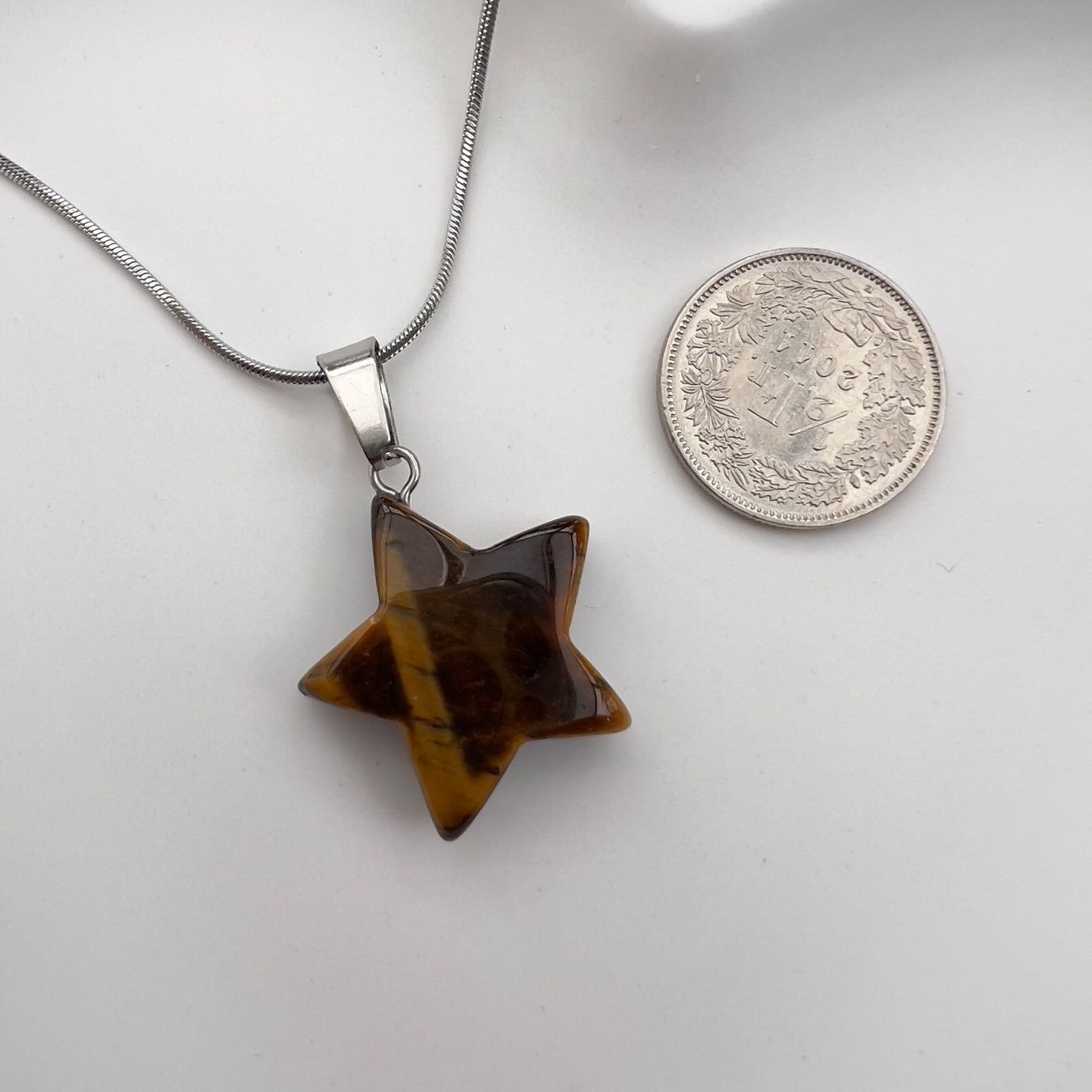 Ciondoli: Pendentif étoile en oeil de tigre – Nuovo e nell'imballaggio originale da Pully venduto da sunaddict 2