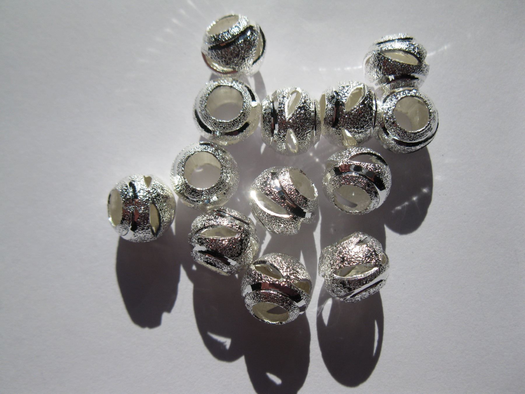 Perle (finte): 7 Stardust Perlen, gestanzt, 10mm – Nuovo e nell'imballaggio originale da St. Margarethen TG venduto da LuanaKa