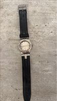 Montre Swatch bracelet noir état acceptable