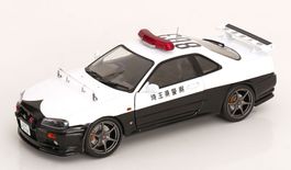 NISSAN SKYLINE GT-R R34 POLICE 1999 1:18 SOLIDO