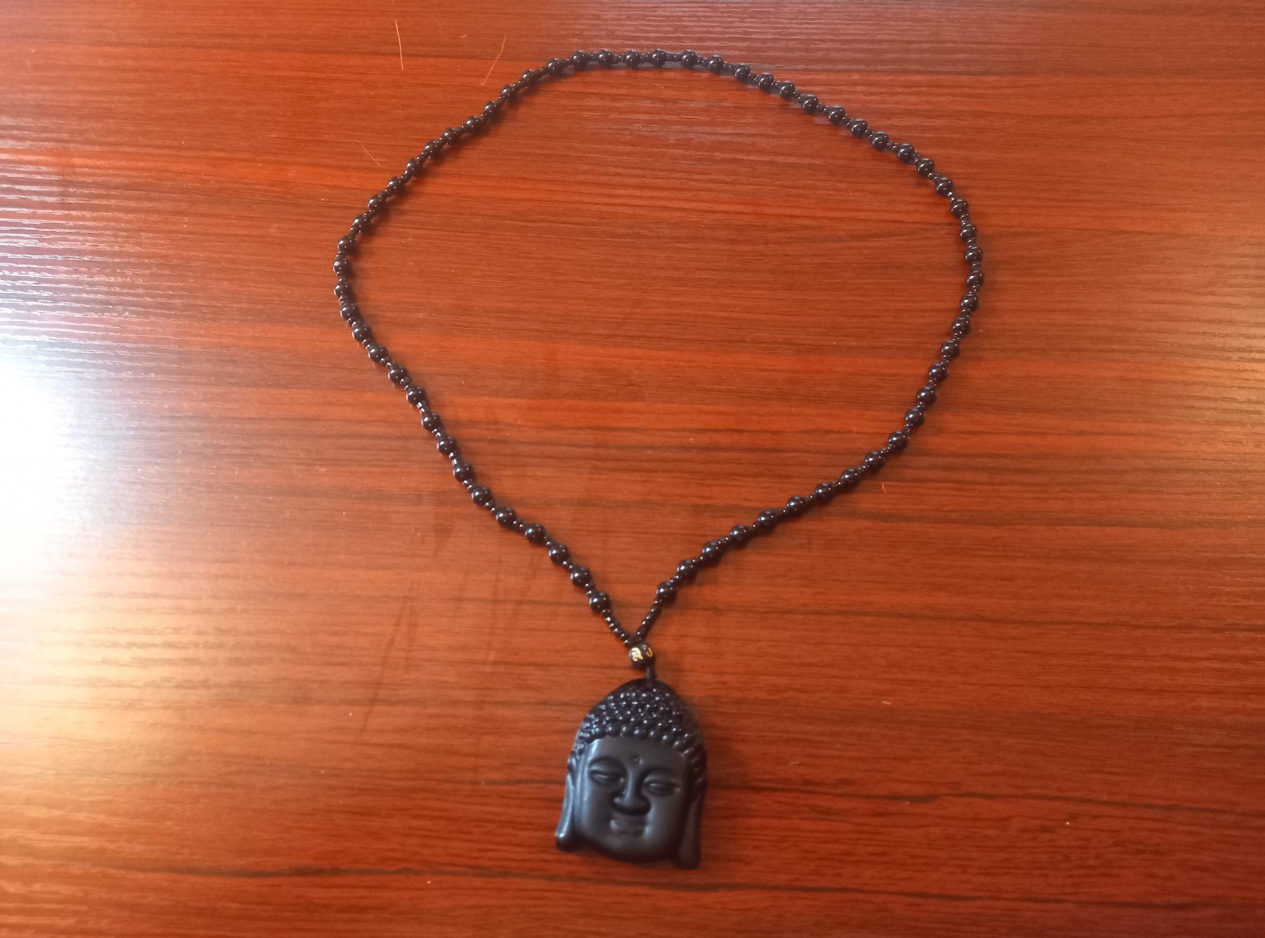 Catenine: Obsidian Buddha Halskette - Collier Buddha en obsidienne – Nuovo e nell'imballaggio originale da Bussigny venduto da NATURALO