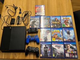 PS4 mit zwei Kontroller, Ladestation und Spiele