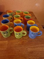 Set von 12 Tassen mit Gesicht bunt