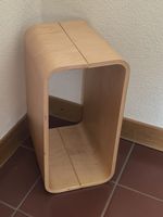 Porte-magazines design en bois courbé