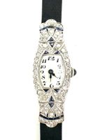 Montre Art-Déco, platine, diamants et saphirs