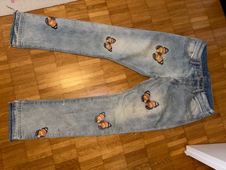 limited denim jeans mit Schmetterling prints