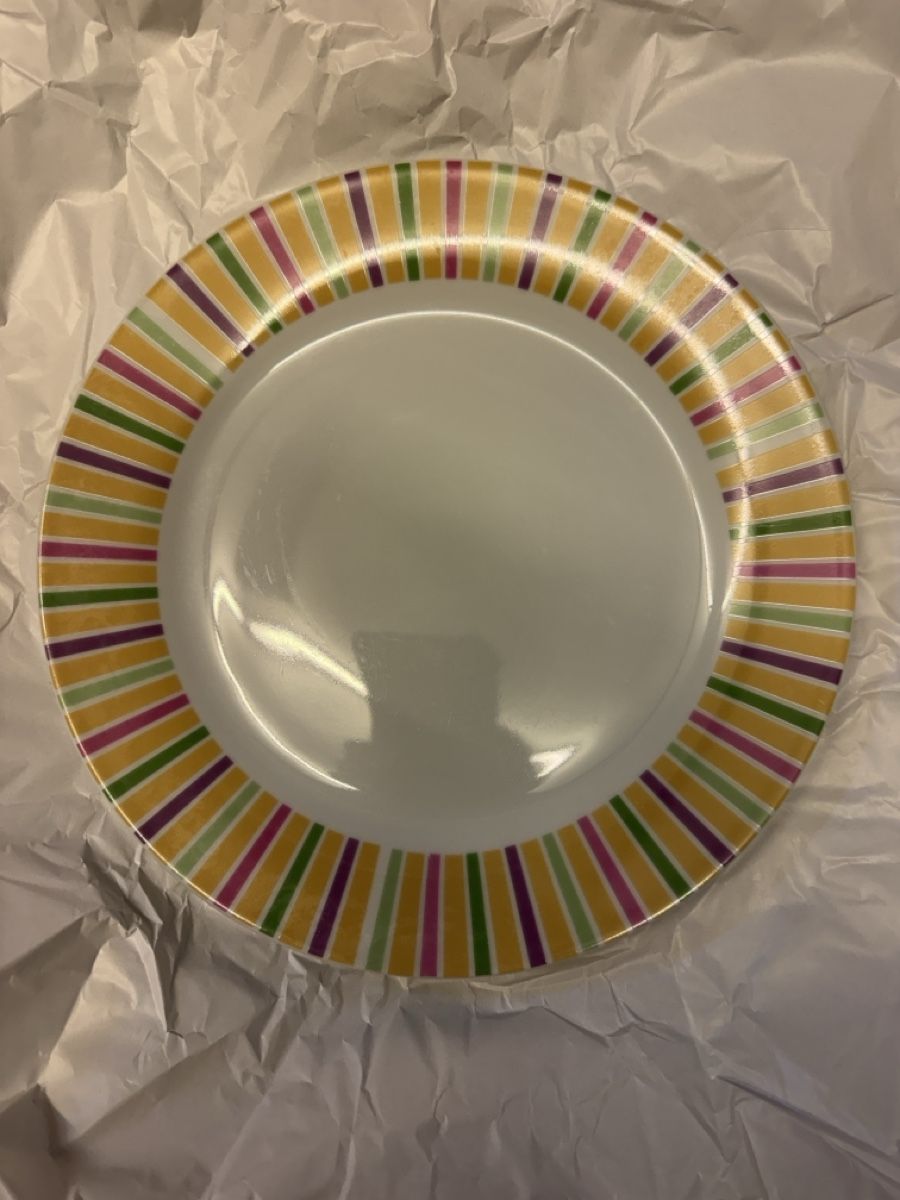Set di piatti: Plate with colorful stripes excellent condition – Usato da Thalwil venduto da Maricortin