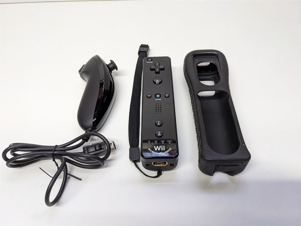 Nintendo Wii Controller + Nunchuck Kaufen auf Ricardo
