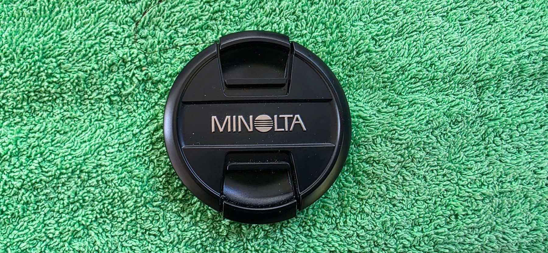Filtres: Minolta  Objektiv Front-Deckel 55 mm, gebraucht – D'occasion à Cugnasco par surfin60