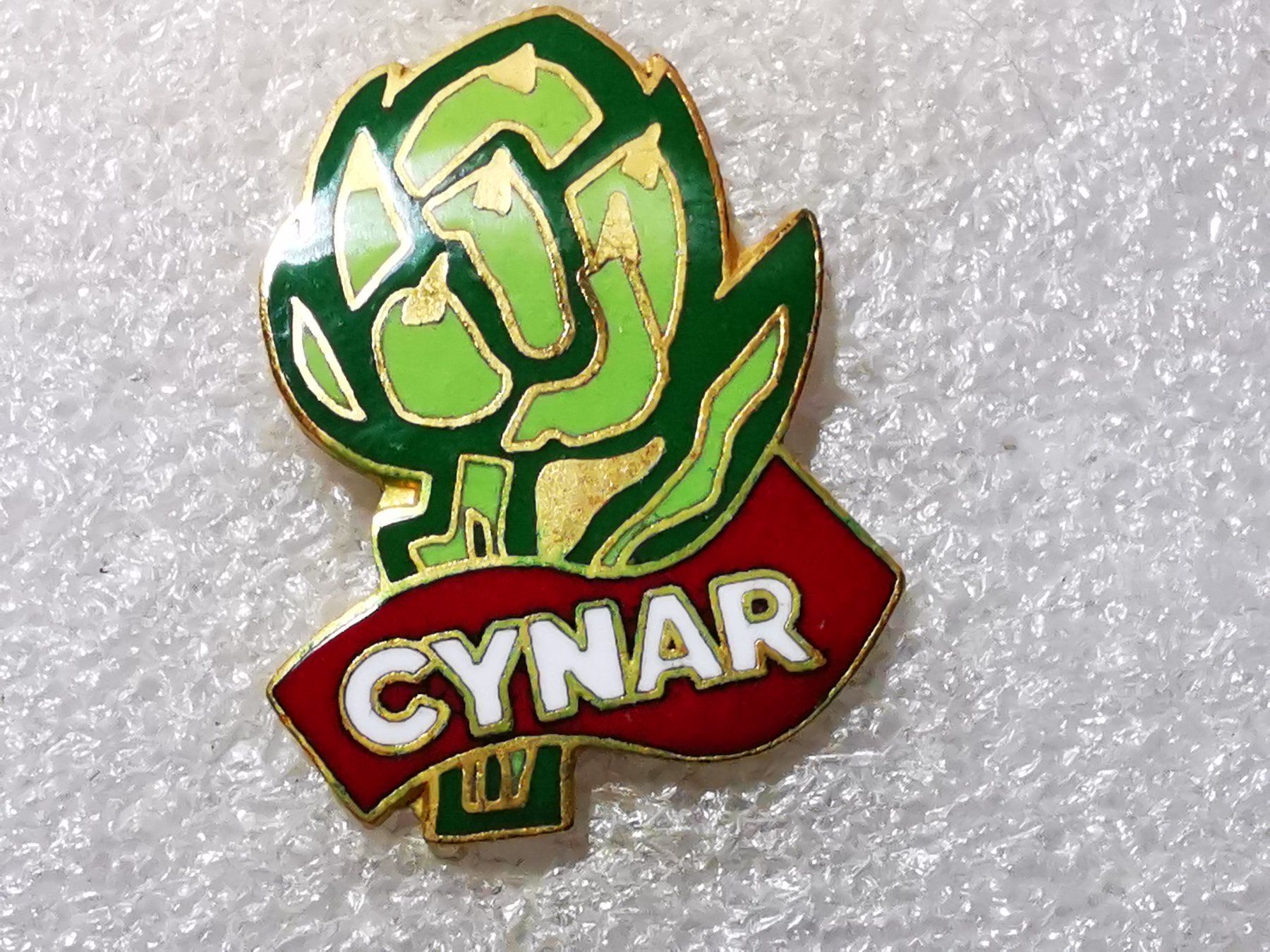 Placchette & Badge: Ansteckpin 78: Cynar – Usato da Oppligen venduto da Pin-Fall-Shop