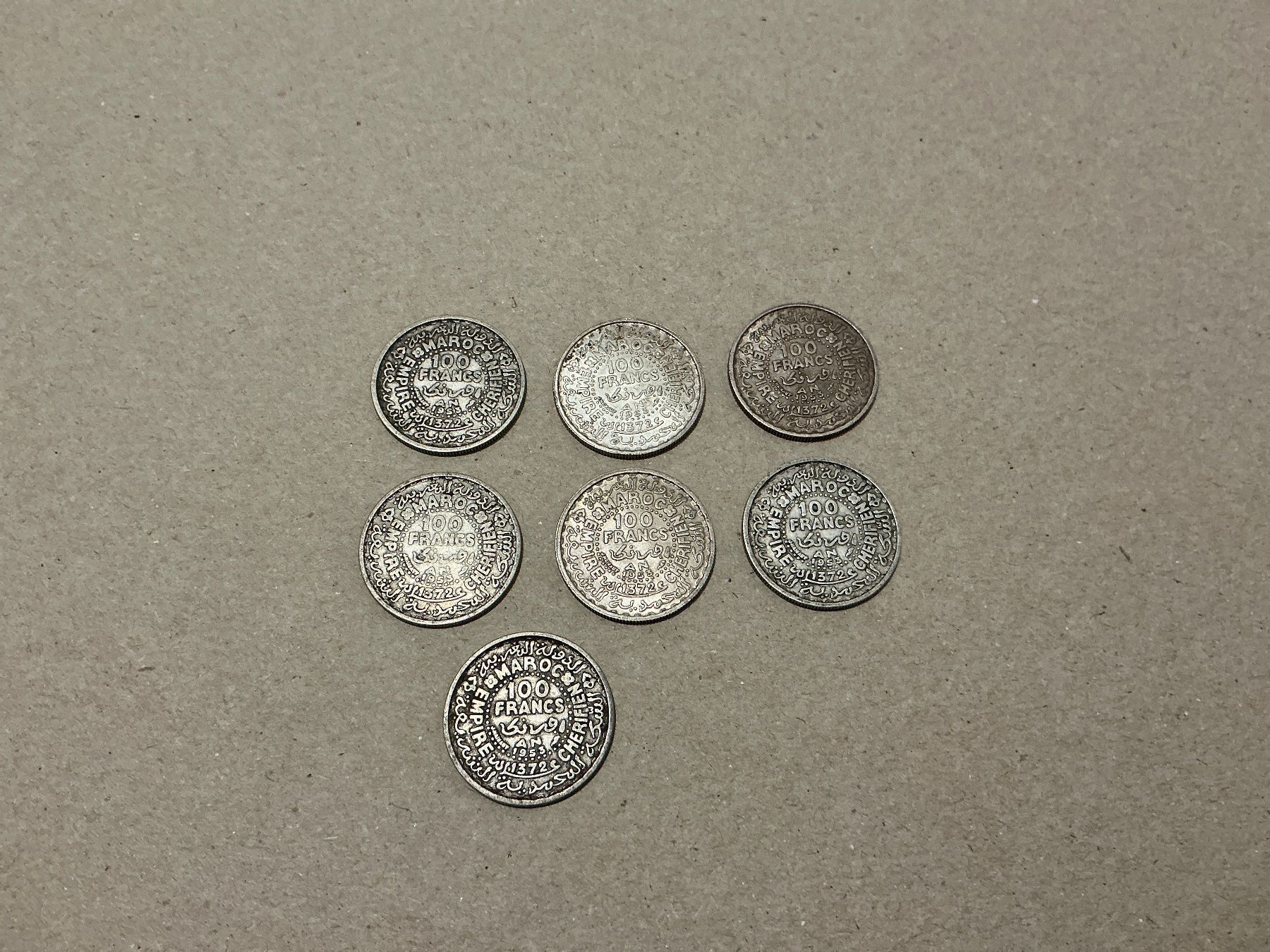 Tutti le monete: 7 x 100 Francs Marokko 1953 – Usato da Oberurnen venduto da Numi2000